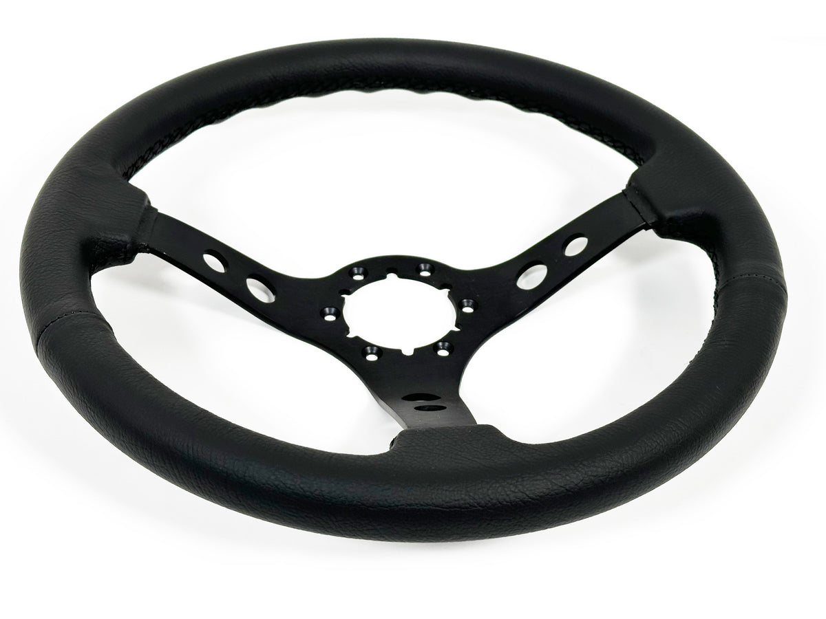 VSW ST3094BLK 6-bolt Sport steering wheel, genuine black leather grip, black aluminum 3-spoke center with holes, 14" diameter