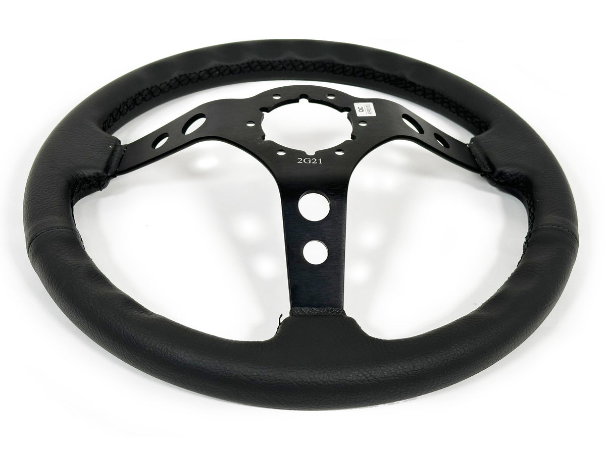 VSW ST3094BLK 6-bolt Sport steering wheel, genuine black leather grip, black aluminum 3-spoke center with holes, 14" diameter